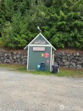 The HOA maintains this clubhouse complete with water to flush your outboards or just wash down your equipment.  There is an outhouse in the back so you don't have to make the trek home if your barbequing or havine a party on the beach!  There is ample parking for vehicles here too!