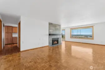 Spacious living room with stunning Puget Sound and island views.