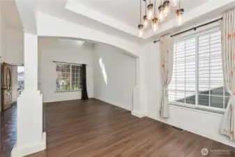 Open dining space flows seamlessly to the living room and kitchen.