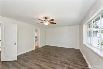 Expansive primary bedroom with walk-in closet and spa-like ensuite bath.