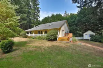 West/South view. Southern deck has French Doors that open to the kitchen.