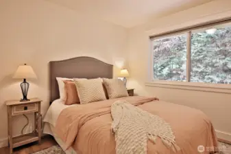Bedroom #3, also looks out upon the eastern portion (and fenced) of the yard.