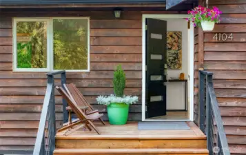 Upper level entry through a stylish modern accent door.....