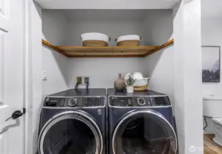 Upper level washer and dryer space.