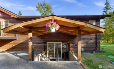 Second lower level entry from the back of the home with sliders.  Unfinished lower level can function when finished as its own independent living space - kitchen, washer and dryer space, and 3/4 bathroom.  Living room and 2 bedrooms - could be converted to three bedrooms.