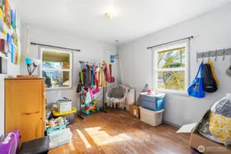 Second bedroom with dual windows for natural light.