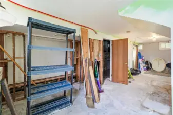 The unfinished basement offers a fantastic opportunity for a workshop, home gym, or additional finished living space.