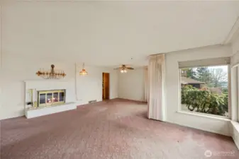 Living room with wood burning fireplace
