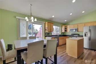 Very spacious space off the kitchen that leads to a large yard