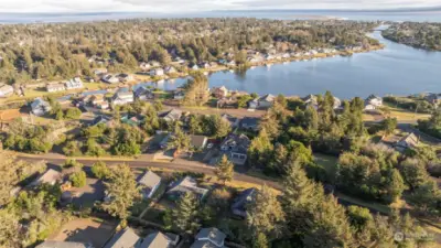 DRONE VIEW OF THE HOME WITH LAKE MINARD AND THE BAY IN THE BACKGROUND!