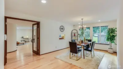 Enjoy hosting in this large dining room with charming pass through window to the kitchen and endless views of the golf course.