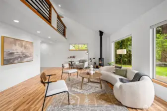 This versatile living space with workspace loft above allows for so many creative design options.