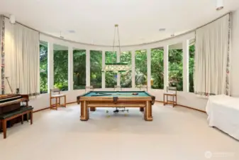 Grand room with rounded windows
