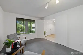 Large office room with closet on the main floor.