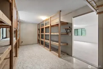 Upstairs flex space - a craft room with plenty of storage space.