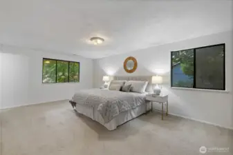 Huge primary bedroom stretches across the whole top floor.