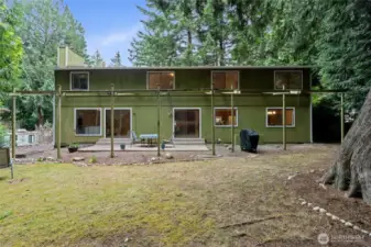 The backyard is a serene, park-like setting!