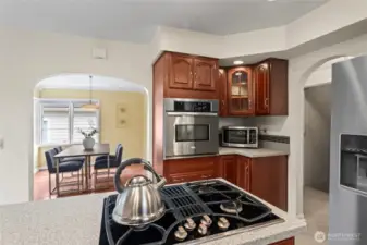 A view into the dining room from behind the kitchen counter