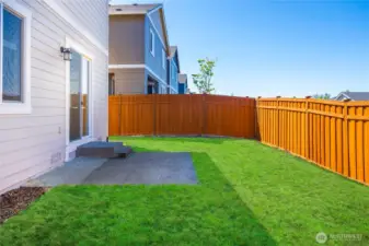 Flat yard, with plenty of privacy from backdoor neighbor. It is a blank canvas.