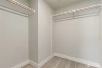 Walk-in closet - This photo is for sample purposes only and not the actual home.