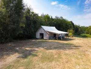 Original barn built in 1940 offers covered storage for hay, equipment or animals.