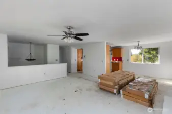 Upstairs living room. New doors that can be used to reframe some of the doorways with missing doors.