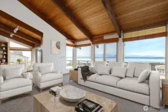 Virtually staged. Soaring open-beam ceilings create a sense of space.