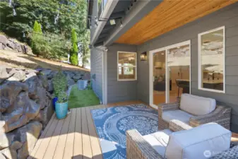 Deck with covered sitting area.