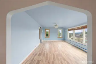 Entrance to spacious living room overlooking the city & river