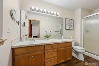 Having a 3/4 bath in the primary bedroom of a rambler is smart design. Great for aging in place!