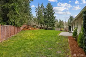 Landscaped yard with 9 zone sprinkler system