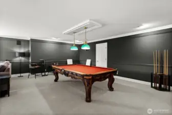 New paint and carpet in this spacious game room with pool table and wet bar (pool table conveys).