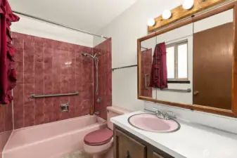 Primary ensuite bathroom with counterspace and room for full tub.