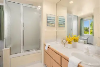 The upper level's primary bath has two sinks and an always-appreciated separate room for the toilet.