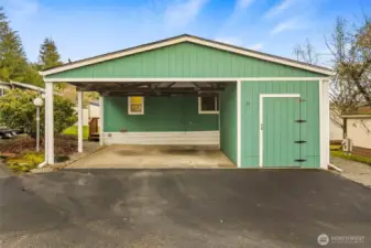 2-car carport with storage shed