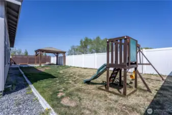 fully fenced backyard w rv parking