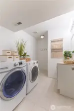 Downstairs Bath, shower, and laundry