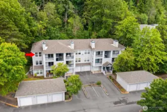 Top-Floor End Unit — Surrounded by greenery for ultimate privacy and tranquility.