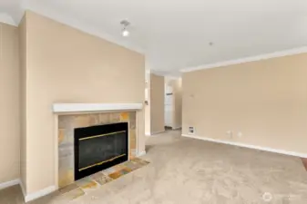 Stylish gas fireplace anchors the living area beautifully!