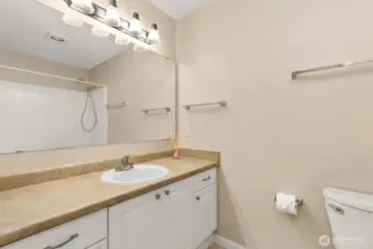 Primary ensuite offers full bath with functional layout and more storage.