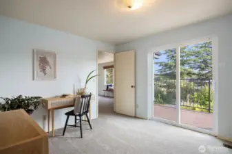 The ensuite office for the primary bedroom that provides access to the balcony and is not one of the six bedrooms.
