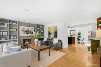 Cozy Gas Fireplace and Built-In Shelves.