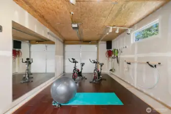 2 Bay Garage. 1 Bay Currently Set Up as a WorkOut Space.