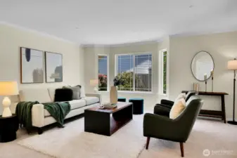 This large formal living room features a bay window. Bring on the entertaining!