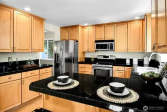The perfect breakfast bar gives an informal dining option to this comfortable kitchen.