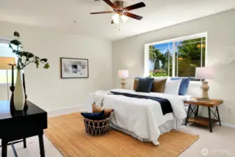 Upstairs, the primary suite doesn't disappoint. There's plenty of room here for a king-sized bed...