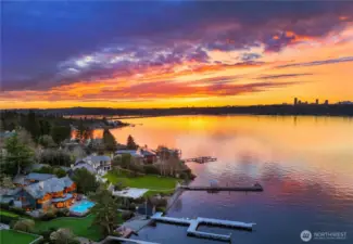 Experience the very best of lakefront living- 85 feet of private waterfront, a pristine beach & fire pit at the water's edge. Plus rare, grandfathered-in boat house and exclusive lake water rights for landscape irrigation.