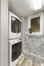 Downstairs Bath includes stacked Washer & Dryer.