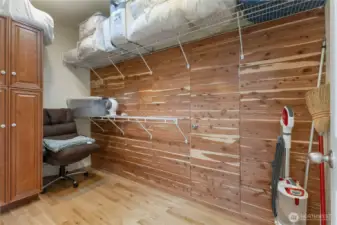 Primary Bedroom #2 cedar lined walk-in closet and storage area.