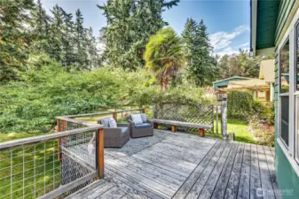 South facing deck outside draped in roses